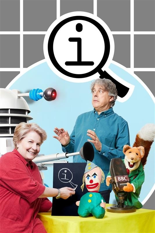 Sandi Toksvig and Alan Davis surrounded by a Dalek, Basil Brush and clown plush toy with the QI logo. 