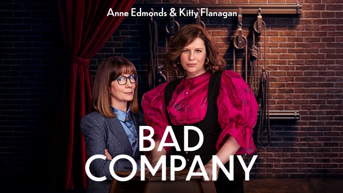 Anne Edmonds and Kitty Flanagan on a theater stage with ropes and curtains for their show Bad Company.