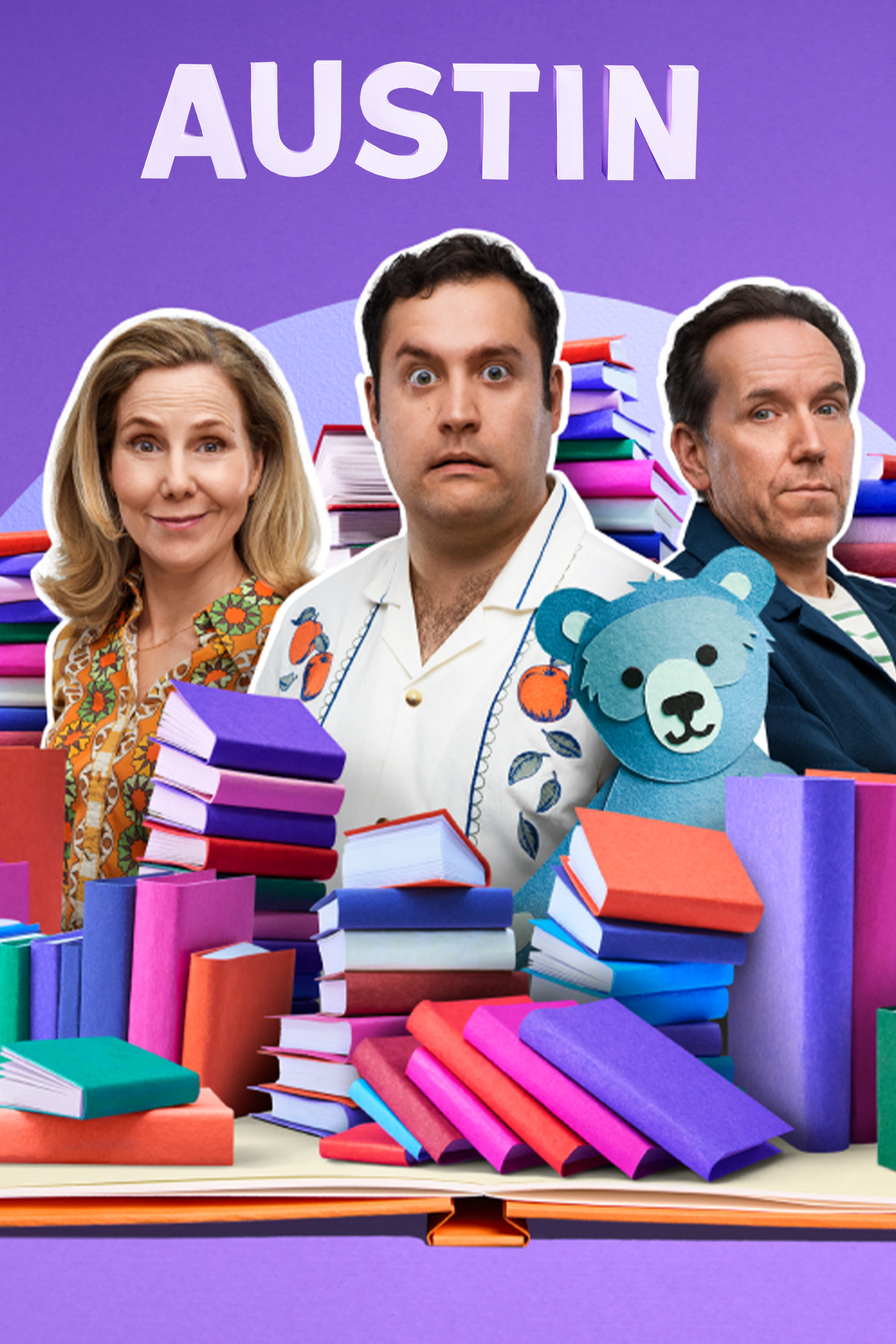 Michael Theo, Ben Miller and Sally Phillips surrounded by colourful stacked books and a cartoon bear on a purple background, with the show title Austin above.