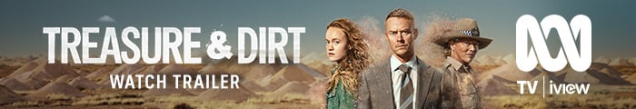 Three people stand before a dusty background with mounds of dirt. Watch the trailer for Treasure & Dirt. Also features the iview logo. 
