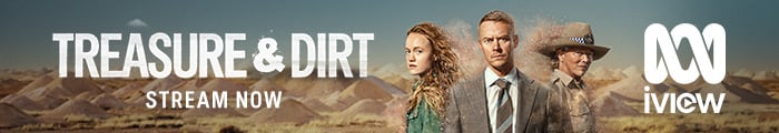 Three people stand before a dusty background with mounds of dirt. Watch the trailer for Treasure & Dirt. Also features the iview logo.